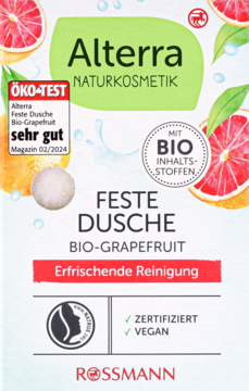 Alterra BIO grejpfrutowa kostka pod prysznic, białe opakowanie z owocami i pieczęcią ÖKO-TEST „sehr gut”.