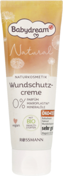 Biało-żółta tubka kremu Babydream Natural przeciw odparzeniom, wegański, z napisem Rossmann, widok z przodu.