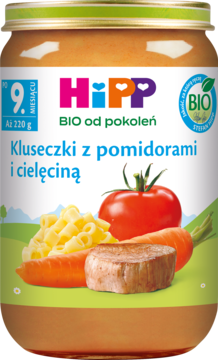 Przedni widok słoiczka HiPP BIO Kluseczki z pomidorami i cielęciną, dla dzieci od 9 miesiąca życia.