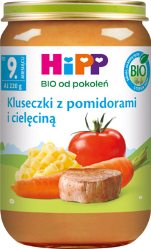 Przedni widok słoiczka HiPP BIO Kluseczki z pomidorami i cielęciną, dla dzieci od 9 miesiąca życia.