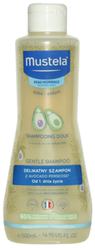 Mustela Delikatny Szampon z Awokado 500ml dla niemowląt, butelka z białym korkiem i zielonymi liśćmi, widok z przodu.