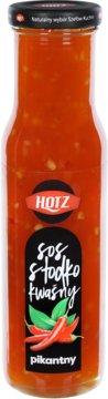 Pikantny sos słodko kwaśny HOTZ w szklanej butelce, etykieta z napisem i czerwonymi papryczkami chili.