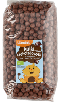 Duża przezroczysta torba ekologicznych kulek czekoladowych BiOminki, z lwem na etykiecie, widok z przodu.