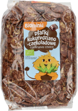 Biominki płatki kukurydziano-czekoladowe, widok z przodu w przezroczystym opakowaniu z etykietą potwora.