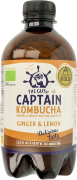 Brązowa butelka Captain Kombucha Ginger & Lemon, z biało-pomarańczową etykietą, widok z przodu, ze złotym medalem.