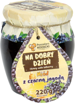 Miód Pszczelarz Kozacki z czarną jagodą (bilberry) w szklanym słoiku 220g, widok z przodu z zawieszką.