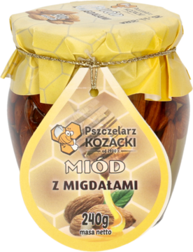 Frontalny widok szklanego słoika miodu Pszczelarz Kozacki z migdałami 240g, z żółtą ozdobną pokrywą i etykietą.
