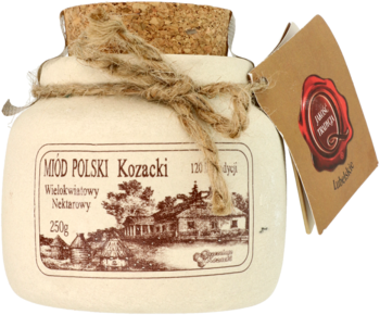 Ręcznie wykonana kamionka z polskim miodem wielokwiatowym, z korkiem i sznurkiem, widok z przodu.