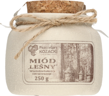 Miód leśny 250g w kremowej, ceramicznej kamionce z korkiem i sznurkiem, widok z przodu.