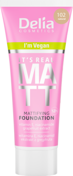 Różowy wegański podkład matujący Delia Cosmetics It's Real Matt 102 Natural w tubce, widok z przodu.