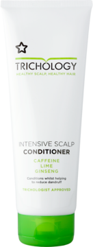 Biała tubka odżywki trychologicznej Trichology z kofeiną, limonką, żeńszeniem i zieloną nakrętką. Widok z przodu.