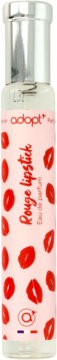 Adopt' Rouge Lipstick woda perfumowana w butelce z jasnoróżową etykietą w czerwone usta, widok z przodu.
