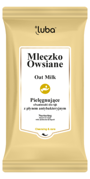 Pielęgnujące chusteczki do rąk Luba Mleczko Owsiane z płynem antybakteryjnym w złotej saszetce, widok z przodu.