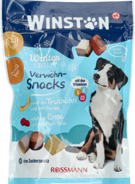 Niebieska paczka Winston Verwöhn-Snacks Winter Edition dla psów, z psem, przysmakami i płatkami śniegu.
