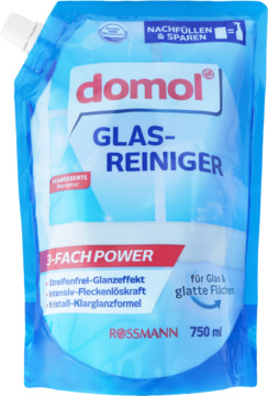 Niebieski płyn Domol do szyb w opakowaniu uzupełniającym 750ml, widok z przodu, z formułą krystalicznej czystości i połysku.