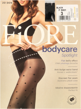 Czarne rajstopy Fiore Bodycare Spotlight 20 DEN z efektem płaskiego brzucha i kropkami, na modelce.