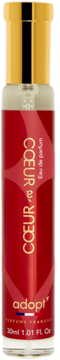 Adopt' Coeur a Coeur Eau de parfum, czerwona butelka ze złotą nakrętką, widok z przodu, 30ml.