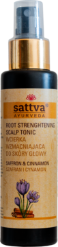 Sattva Ayurveda Root Strengthening Scalp Tonic w ciemnej butelce ze złotym rozpylaczem, z etykietą Saffron & Cinnamon.