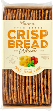 Przezroczyste opakowanie Danvita Oven Baked Crisp Bread z serem, pomidorem i bazylią, widoczne ułożone chlebki.