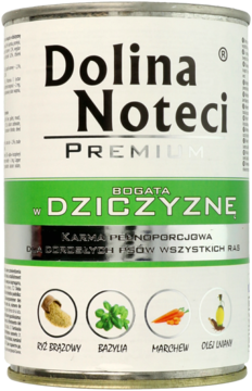 Srebrna puszka karmy Dolina Noteci Premium dla psów, bogata w dziczyznę, ryż, bazylię i marchew, widok z przodu.