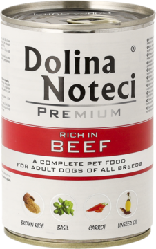 Biała puszka karmy Dolina Noteci Premium dla psów, z czerwoną etykietą "RICH IN BEEF", widok z przodu.