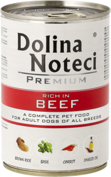 Biała puszka karmy Dolina Noteci Premium dla psów, z czerwoną etykietą "RICH IN BEEF", widok z przodu.