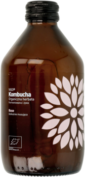 VIGO Kombucha Rose, organiczna herbata w brązowej butelce z kwiatowym wzorem na etykiecie, widok z przodu.