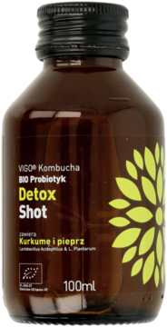 VIGO Kombucha Detox Shot, ciemna szklana butelka z probiotykiem, z żółtym kwiatem, widok z przodu.