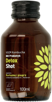 VIGO Kombucha Detox Shot, ciemna szklana butelka z probiotykiem, z żółtym kwiatem, widok z przodu.