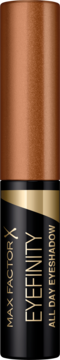 Max Factor Eyefinity All Day Eyeshadow w pionowej tubce. Metaliczny miedziany cień do powiek, czarny spód ze złotym logo.