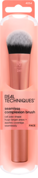 Real Techniques seamless complexion brush 241 in clear retail packaging, with rose gold handle and fluffy black/white bristles.