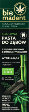 Zielone opakowanie pasty Bio Madent Konopna z CBD, węglem, bambusem, tymiankiem, widok z przodu.