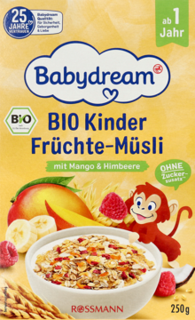 Żółte opakowanie Babydream BIO Musli dla dzieci z mango i malinami, widok z przodu z miską płatków.