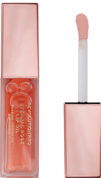 Revolution Pro Eternal Rose Lip Oil w przezroczystej butelce i różowo-złotej zakrętce, z aplikatorem obok.