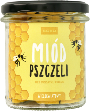 Słoik miodu pszczelego wielokwiatowego SOXO z czarną nakrętką i żółtą etykietą z wzorem plastra miodu, widok z przodu.
