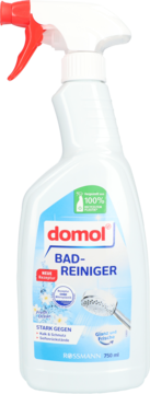 Domol Płyn do czyszczenia łazienek 750ml, biała butelka ze spryskiwaczem, etykieta z niebieskimi detalami, widok z przodu.
