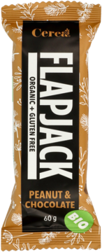 Pionowy baton Cerea Flapjack Peanut & Chocolate 60g, bio i bezglutenowy, w brązowo-czarnym opakowaniu z liśćmi.