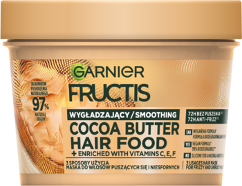 Jasnobrązowy słoik Garnier Fructis Cocoa Butter Hair Food, wygładzająca maska do włosów puszących się, widok z przodu.