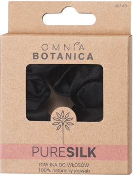 Omnia Botanica PURESILK: czarna owijka do włosów z jedwabiu, widoczna w okienku tekturowego opakowania.