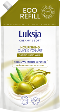 Luksja Creamy & Soft mydło oliwka i jogurt, biała saszetka refill z oliwkową grafiką i zieloną nakrętką.