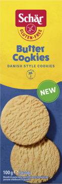 Schar bezglutenowe Butter Cookies duńskie, w żółto-niebieskim opakowaniu, z okrągłymi ciastkami.