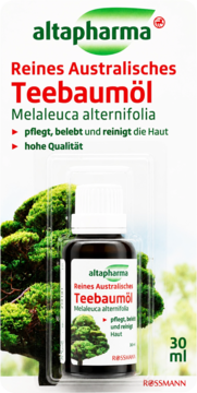 Altapharma czysty australijski olejek z drzewa herbacianego 30ml, w butelce z kroplomierzem, na zielonym tle.