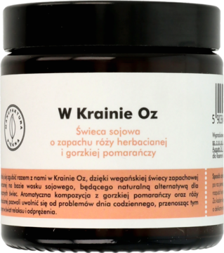 Słoik wegańskiej świecy sojowej, widok z przodu, zapach róży herbacianej i gorzkiej pomarańczy, 'W Krainie Oz'.