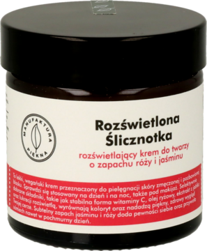 Manufaktura Piękna Rozświetlona Ślicznotka, rozświetlający krem do twarzy o zapachu róży i jaśminu, ciemny słoik z czerwoną etykietą, widok z przodu.