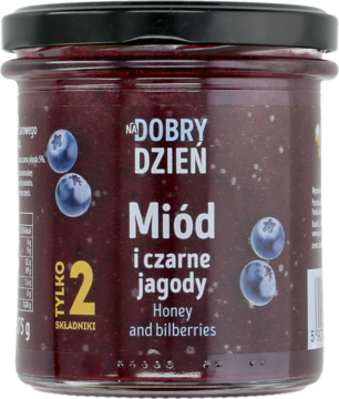Szklany słoik miodu Dobry Dzień z czarnymi jagodami, widok z przodu, ciemnofioletowy miód i etykieta z owocami.