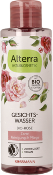 Alterra BIO-ROSE Gesichts-Wasser w przezroczystej butelce z różami, widok z przodu, z certyfikatem vegan.