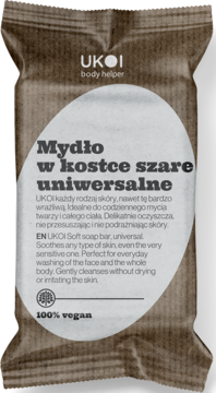 UKOI uniwersalne szare mydło w kostce, w brązowym papierowym opakowaniu z białym owalnym logo, 100% vegan.