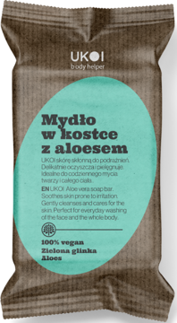 Mydło w kostce UKOI z aloesem i zieloną glinką, w brązowym ekologicznym opakowaniu z zieloną etykietą, widok z przodu.