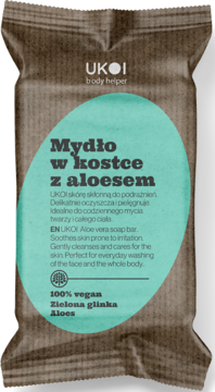 Mydło w kostce UKOI z aloesem i zieloną glinką, w brązowym ekologicznym opakowaniu z zieloną etykietą, widok z przodu.