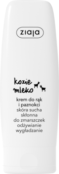 Biała tubka kremu do rąk i paznokci Ziaja Kozie Mleko, z czarnymi napisami i sylwetkami kóz, widok z przodu.